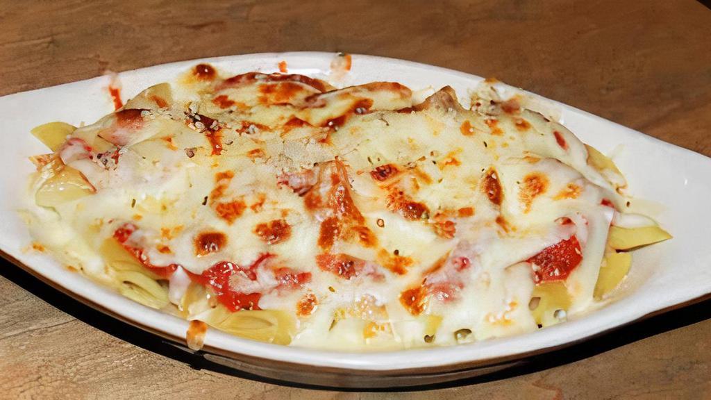 Lunch Baked Mostaccioli · Mostaccioli topped with choice of Meat or Marinara Sauce, Melted Mozzarella Cheese and served with Housemade Breadsticks.