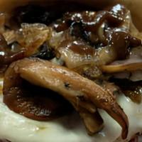 A-1 Mushroom Burger · 1/2 Pound Short Rib Brisket Blend topped with Sauteed Mushrooms, Caramelized Onions, A1 Sauc...