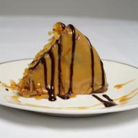 Caramel Cake · One slice. Moist yellow cake covered with a homemade caramel.