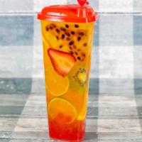 Passion Fruit Tea · Our fruity green tea ,crafted with delightful fresh fruit slices,served over ice --a welcomi...