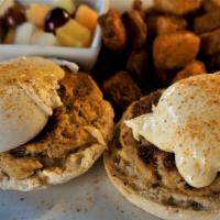 Crab Cake Benedict · Two crab cakes, poached eggs, old bay hollandaise, hash browns, and fruit.

Consuming raw or...