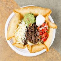 Taco Salad · Choice of: Chicken, Steak, Barbacoa, Chorizo, Ground Beef, Carnitas or Al Pastor. served w/ ...