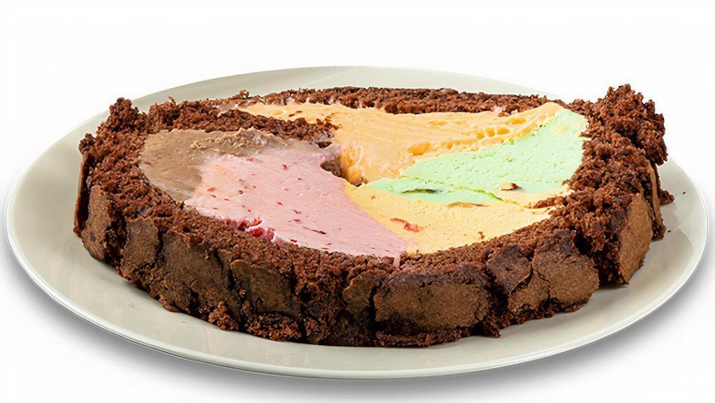 Rainbow Cake Roll Slice · Single slice of chocolate cake rolled with five flavors of the Rainbow Cone  **Contains Nuts**