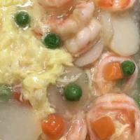 Shrimp With Lobster Sauce (Small) · Jumbo gulf shrimp sautéed with minced garlic in a thick hearty meat sauce, topped with green...