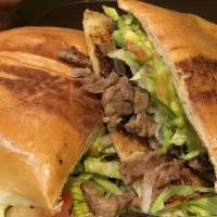 Torta · Large bread, melted mozzarella cheese, your favorite meat, sour cream, beans, rice, lettuce,...