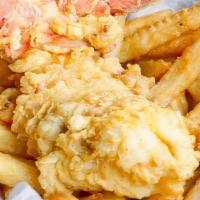 Lobster Tail & Chips · Delicious Battered & Deep fried Maine Lobster Tail Serve with our House Chips or fries