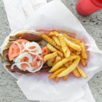 Gyros Sandwich · Onion, tomato, homemade tzatziki (Greek) sauce served on pita.