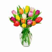 Tulips · Tulips mixed colors in a gathering vase.