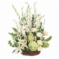 Peaceful Basket · Send your deepest condolences to the family and friends with a basket of flowers that truly ...