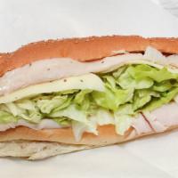 Santa Fe Turkey Sub · Oven roasted turkey, cheddar cheese, hot peppers, onion, lettuce, tomato and mayo.
