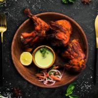 Chicken Tandoor (4 Pcs) · Bone-in chicken marinated in yogurt and house spices cooked to perfection in an Indian clay ...
