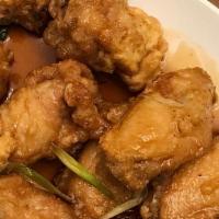 Garlic Chicken Wings · Deep fried wings in savory garlic sauce