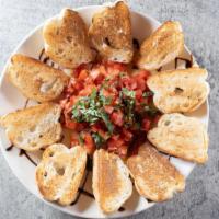 Bruschetta · Diced roma tomatoes, fresh basil, garlic, and extra virgin olive oil blended together. Serve...