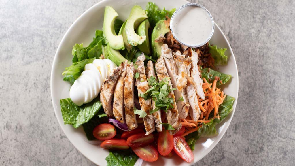 Cobb Salad · Romaine leaves, grilled chicken, bacon, red onion, carrot, tomato, hard boiled egg and avocado. Choice of dressing.