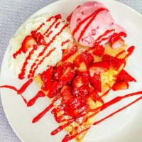 Strawberry And Cream Crepe (Served With Ice Cream) · Strawberries, strawberry ice cream, whipped cream, strawberry drizzle and powdered sugar.