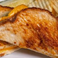 Grilled Cheese · Grilled brioche bread with American cheese.