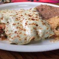 Burrito Dinner · One burrito containing your choice of filling onions, cilantro. Served with rice and beans o...
