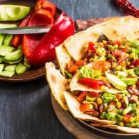 Vegetarian Taco Salad Bowl · Lettuce, beans, green pepper, onions, tomato, spinach, broccoli, mushrooms, avocado, cheese ...
