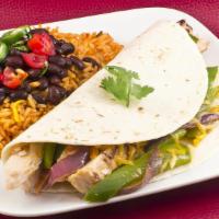 Vegetarian Fajitas · Spinach, green peppers, mushrooms, tomatoes, onions. Served with rice and beans
