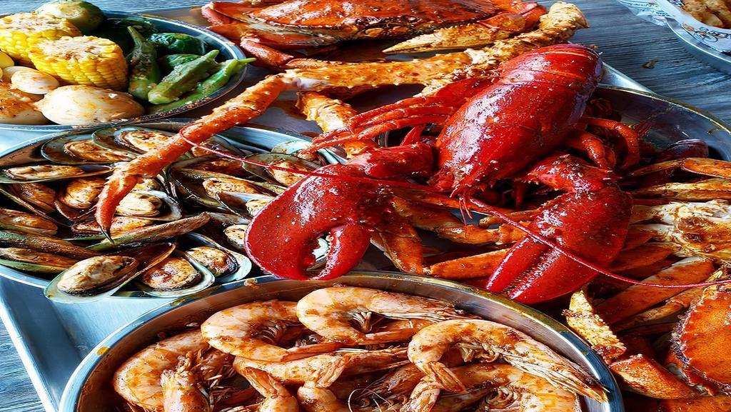 Seafood Platter (Chapuzon De Mariscos) · Shrimp, mussels, crab meat, octopus, and fish fillet.