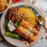 Enchilada Dinner · Served with your choice of one meat or vegetarian filling with rice and beans.