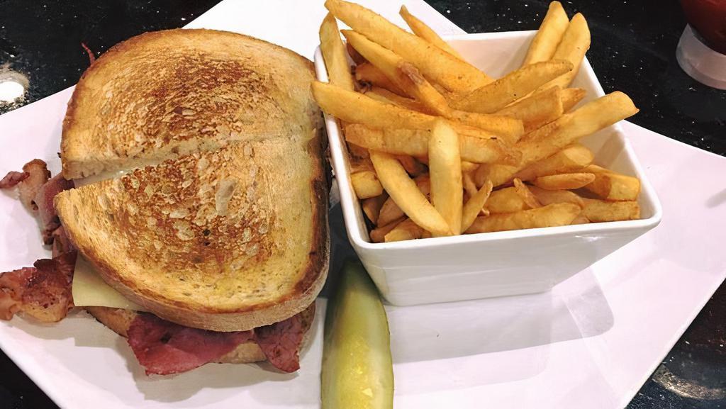 Grilled Ham & Cheese · Hot sandwich filled with pork and cheese that has been pan cooked or grilled.