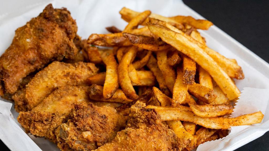 6 Fried Chicken Wings · Try our RIDICULOUS 6 piece jumbo chicken wings tossed in our seasoned flour and deep fried. Add hand-cut fries for an additional charge.