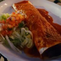 Burrito Chile Colorado · Grilled steak simmered in colorado sauce, rolled with beans in a large ﬂ our tortilla and sm...