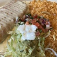 Classic Chimichanga · A large ﬂour tortilla ﬁlled with your choice of shredded beef, chicken or ground beef, deep-...