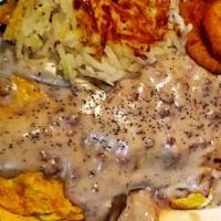 Southern Omelette · Sausage, onion, potato, cheese with sausage gravy.