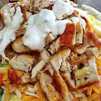 Grilled Chicken Greek Salad · Chicken, lettuce, tomato, cucumber, feta cheese, beets, olives, green peppers, onion and pep...