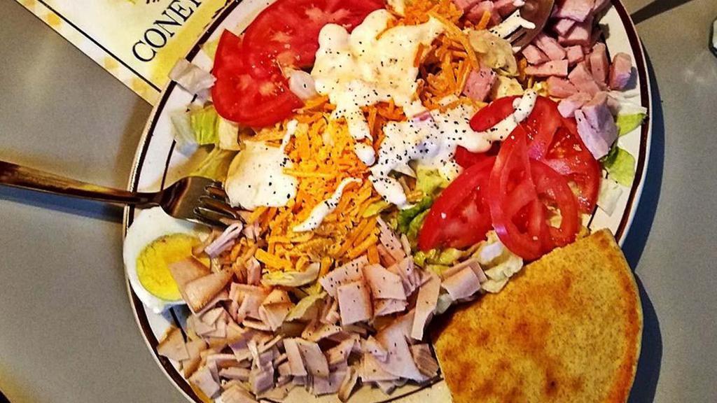 Chef Salad · Lettuce, toamto, cucumber, American and Swiss cheese, turkey, ham and hard boiled egg.