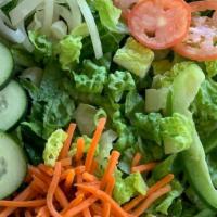 Garden Salad · Fresh romaine lettuce, shredded carrots, green peppers, onions and tomatoes.
