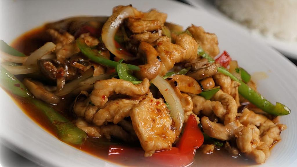 Cashew Chicken · Lightly breaded chicken or tofu with cashews, mushrooms, bell peppers, onions, green onions and cilantro.