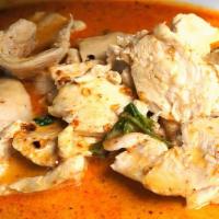 Panang Curry · Medium spicy and slightly sweet curry with coconut milk, cilantro and basil. Choice of chick...