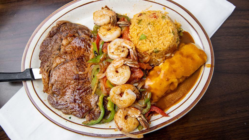 El Tequila Steak · Ribeye steak, grill shrimp with tomatoes, bell peppers, onions. Served with rice and one chicken enchilada.