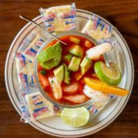 Cocktail De Camaron · Our house recipe cocktail sauce mixture with fresh shrimp, avocado, tomatoes and onion. * 
 ...