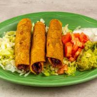 Taquitos · 3 corn tortillas filled with your choice of chicken or shredded beef rolled and deep fried t...
