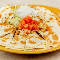 Cheese Quesadilla · A giant flour tortilla filled with melted Monterey Jack cheese and served with shredded lett...