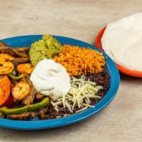 Street Tacos Combo · Choose any combination of 3 tacos served with a side of rice.