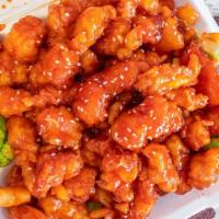 Sesame Chicken · Chunks of chicken sophisticatedly prepared to create a crispy texture then sauteed with a bl...