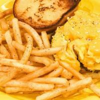 Egg And Cheese Sandwich · Two scrambled eggs with American cheese served on a toasted potato roll with your choice of ...