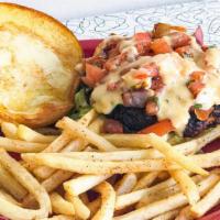 Black Bean Burger Sandwich · Grilled black bean burger on a toasted potato rolland a bed of lettuce. Topped with queso an...