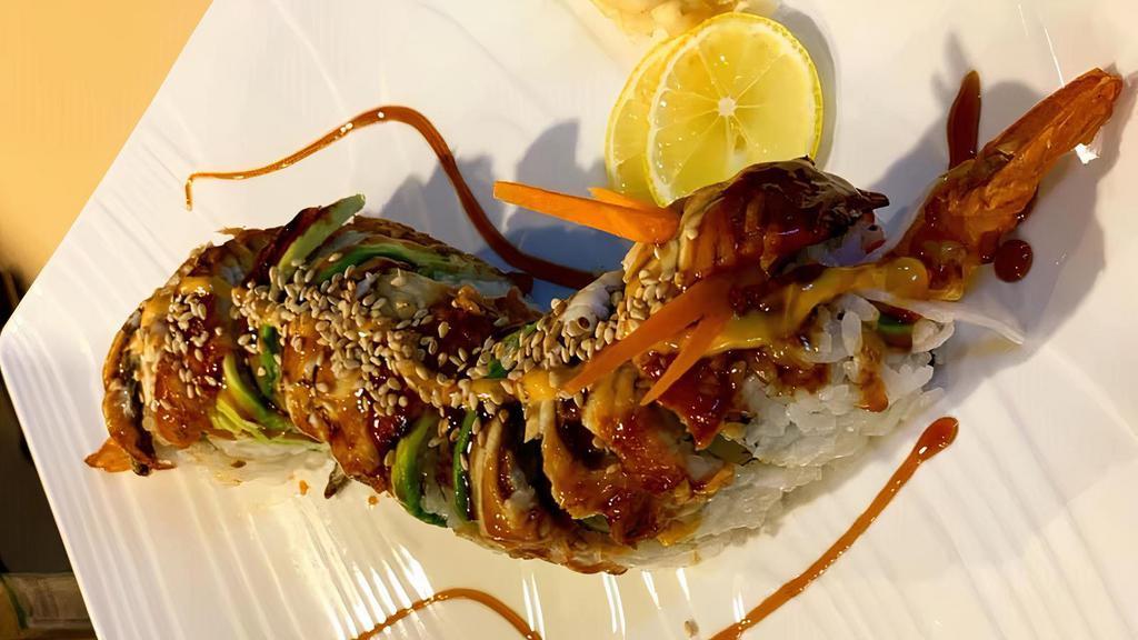 Angry Dragon Roll (10Pcs) · Imitation crab salad, two shrimp tempuras, avocado. Topped with BBQ eel, avocado, spicy mayo, chili sauce, eel sauce, and sesame seeds.