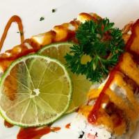 Mango Roll (10Pcs) · Shrimp tempura, imitation crab salad, avocado. Topped with cream cheese, spicy mayo, chili s...