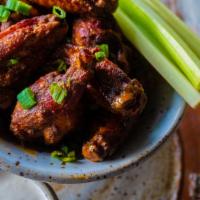 Wings Of Love · Gluten-free. Dry rubbed and smoke: Mojo Rub, Buffalo, or BBQ. Served with bleu cheese, or bu...