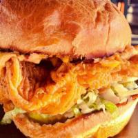 The Funky Chicken (Spicy Chicken Sandwich) · House specialty. Spicy Batter Fried Chicken Breast, House Made Pimento Cheese, Lettuce, Pick...