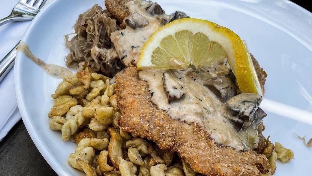 Schnitzel · Schnitzel choice of pork/chicken pan seared with two sides of your choice