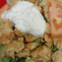Chicken Souvlaki · On pita with tzatziki sauce, onions, lettuce and tomatoes.