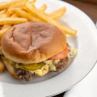 Cheeseburger Value Meal · 1/4 lb burger with ketchup, mustard, lettuce, tomatoes, pickles and grilled onions. Comes wi...